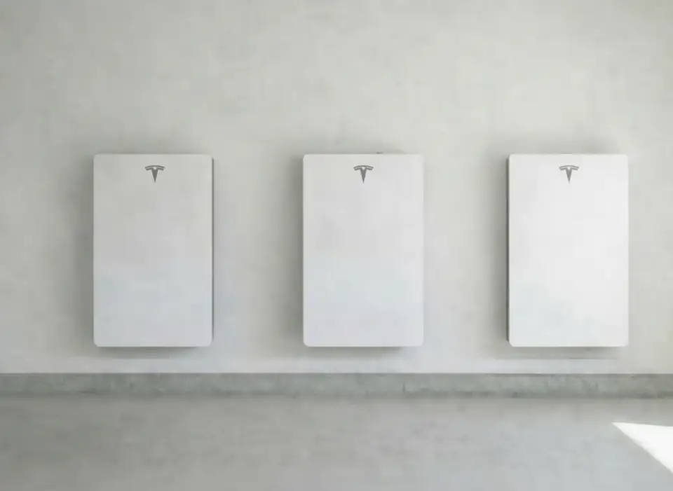 Tesla Powerwall 3 units installed in a residential garage